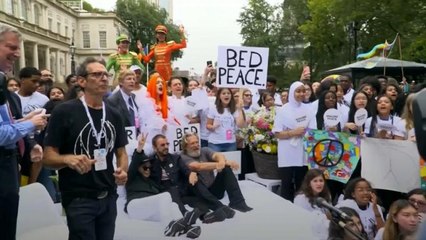 Students get perfect mix of bed and protest in Lennon-inspired NYC event