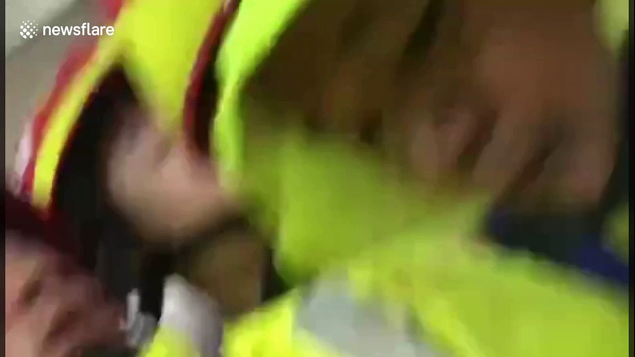 Upturned trees, a falling crane and pedestrians swept off their feet in Typhoon Mangkhut