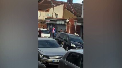 Luton fight Dramatic moment men wielding baseball bats brawl