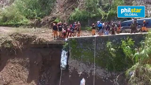 Authorities retrieve another body during a search, retrieval operation in Benguet