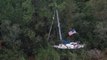 Helicopter Survey Shows Boat Stuck in Trees After Hurricane Florence