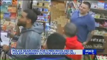 Surveillance Video Shows 5 Men Beating, Robbing Man in NYC