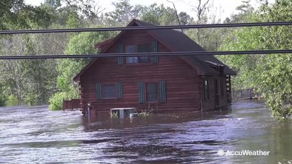 Download Video: Family returns to home submerged in Florence floodwaters