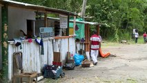 Venezuelan in Colombia aids fellow migrants at roadside shelter
