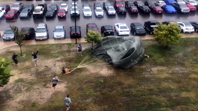 Parachute Collides with Car