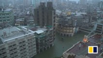 Macau suffers serious flooding and power cuts