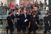 Najib claims trial to 25 graft, money laundering charges
