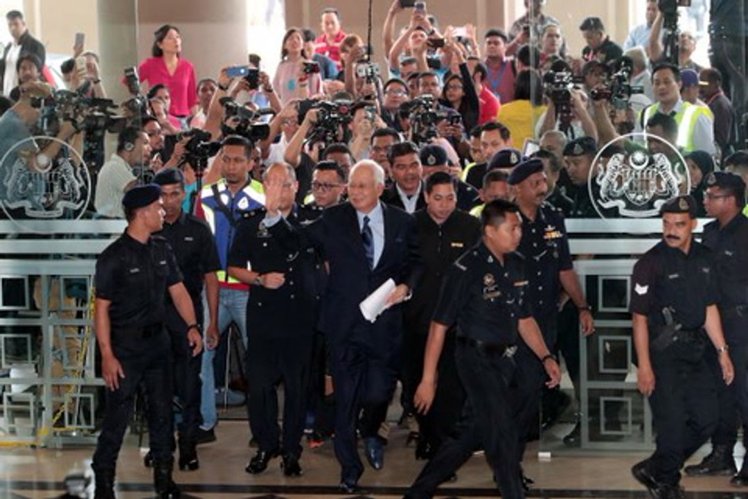 Najib claims trial to 25 graft, money laundering charges