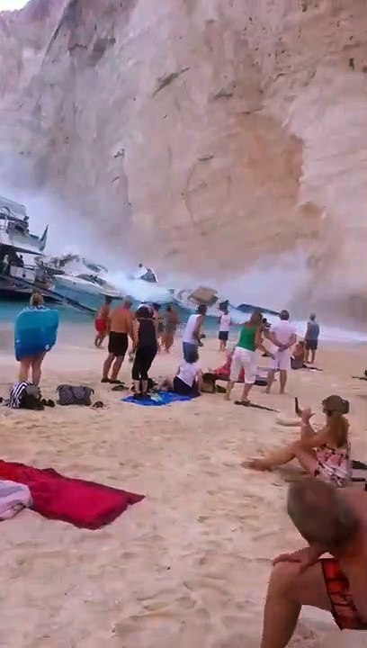 A piece of cliff falls off near a beach in Greece