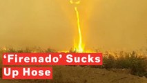 Terrifying Moment Rare Fire Tornado Snatches Firefighter's Hose
