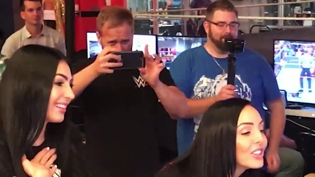 IIconics (Billie Kay and Peyton Royce) react to seeing their entrances for the first time in WWE 2K19