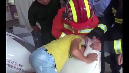 Boy gets head stuck in massage couch