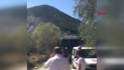 Kütahya'daki Arazi Yangınını Polisler Toma Aracıyla ile Söndürdü