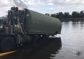 National Guard Sets Up Floating Bridge as Hurricane Florence Floods Move Downstream