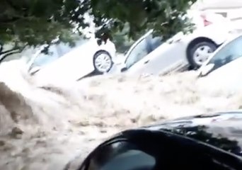 Cars Swept Down Streets Amid Record Rainfall on Tunisia's Cap Bon Peninsula