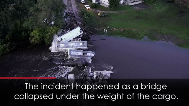 Freight train plunges into river after bridge collapses