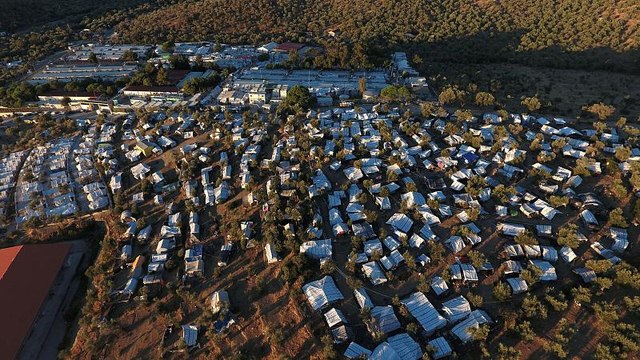 Greek authorities start to relocate migrants from Moria camp