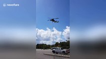 Sandbags airlifted to lake in flooded Carolina city following Hurricane Florence