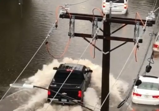 Cars Drive Through Floodwaters in Stamford, Connecticut