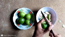 Lovely Cambodian kids eating guavas