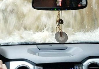 Man Drives Through Floodwaters in Fairfield, Connecticut