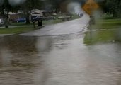 Car Drives Through Flooded Road in Soddy-Daisy, Tennessee