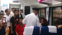 Woman steals other passenger’s seat then splashes filming onlooker