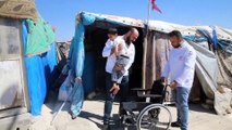 Suriyeli engelli çocuğun tekerlekli sandalye sevinci - HATAY