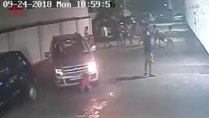 Miraculous Video Of Young Boy Emerging Seemingly Unharmed After Being Run Over By SUV