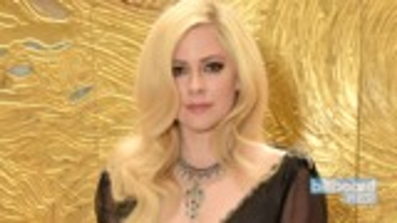 Avril Lavigne Makes First TV Appearance in Years, Performs "Head Above Water" on 'Kimmel' | Billboard News