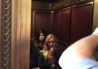 Assault Survivors Confront Jeff Flake After He Gives Backing to Kavanaugh
