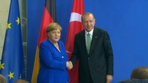 Turkey's Erdogan Pressures Germany's Merkel To Extradite Alleged Terrorists