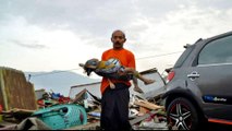 Indonesia earthquake and tsunami kills nearly 400