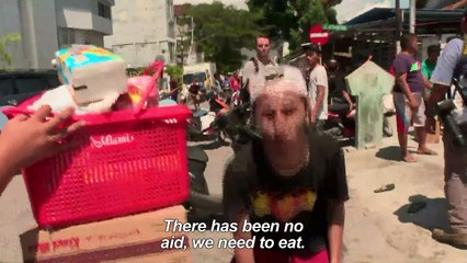 Indonesia quake victims loot shops amid food shortage