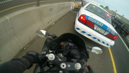 Cop Pretends to Pull Over Motorcycle Rider