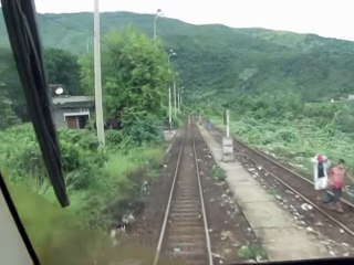 Vietnam trains pass Hai Van Nam station