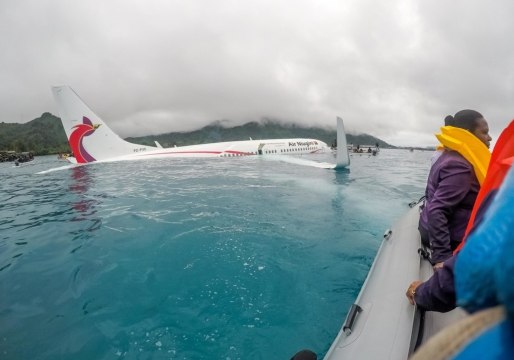 US Navy Sailors Assist After Plane Crashes Into Lagoon