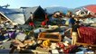 Indonesia plans mass burials for quake and tsunami victims