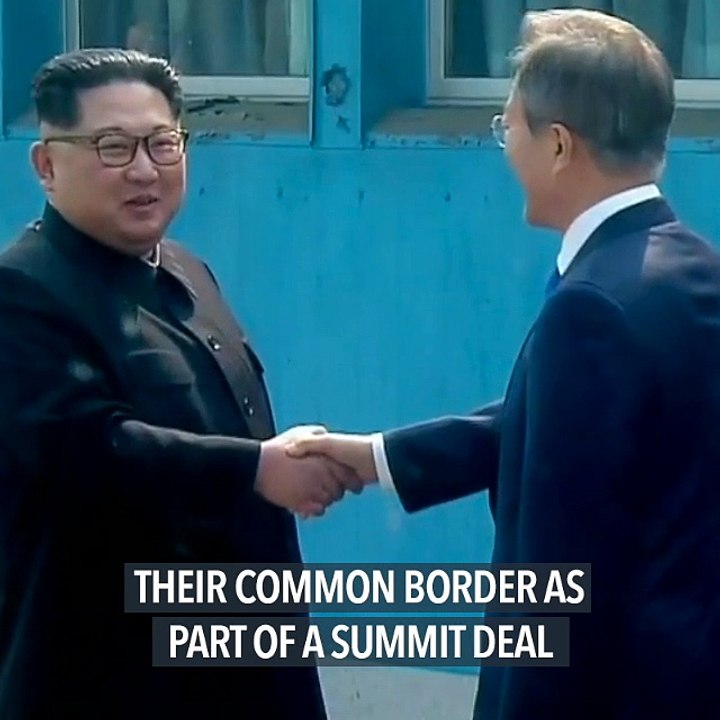 Two Koreas remove landmines at tense border