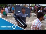 Habitantes de Acapulco aprovecha inundaciones para saquear tiendas y comercios