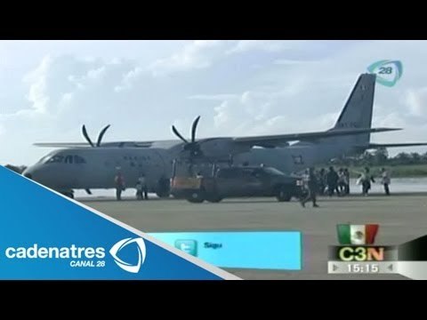 Trasladan turistas varados en Guerrero a la Ciudad de México