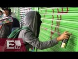Anarquistas rompen vidrios de banco y restaurante /Jóvenes realizan pintas