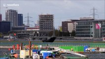 Rare sight of C-130 military transport plane touching down at London City Airport
