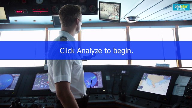 Officer shows inside of the bridge of the Voyager of the Sea