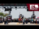 Integrantes de la CNTE toman la caseta México-Puebla y permiten pasar a automovilistas