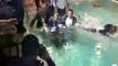 Haymana Belediye Başkanı Özdemir Turgut, TRT KÜRDİ'de yayınlanan Çepik programı sonrasında programın sanatçıları ile birlikte takım elbisesi ile birlikte kaplıca havuzuna girdi