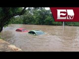 Rescatan a familia atrapada por la lluvia en San Luis Potosí / Titulares con Vianey Esquinca
