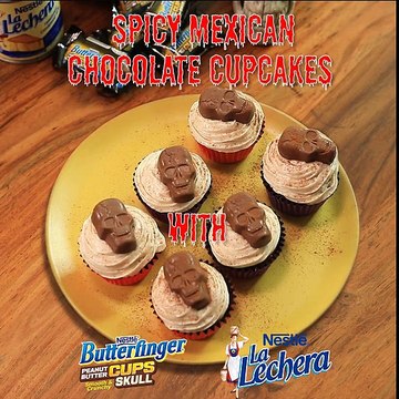 Spicy Mexican Chocolate Cupcakes topped with Nestlé Butterfinger Peanut Butter Cups Skulls