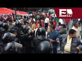CNTE y granaderos se enfrentan en el Monumento a la Revolución / Andrea Newman