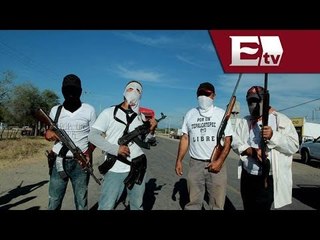 Autodefensas en Michoacán ya no portan armas del Ejército / Titulares de la noche